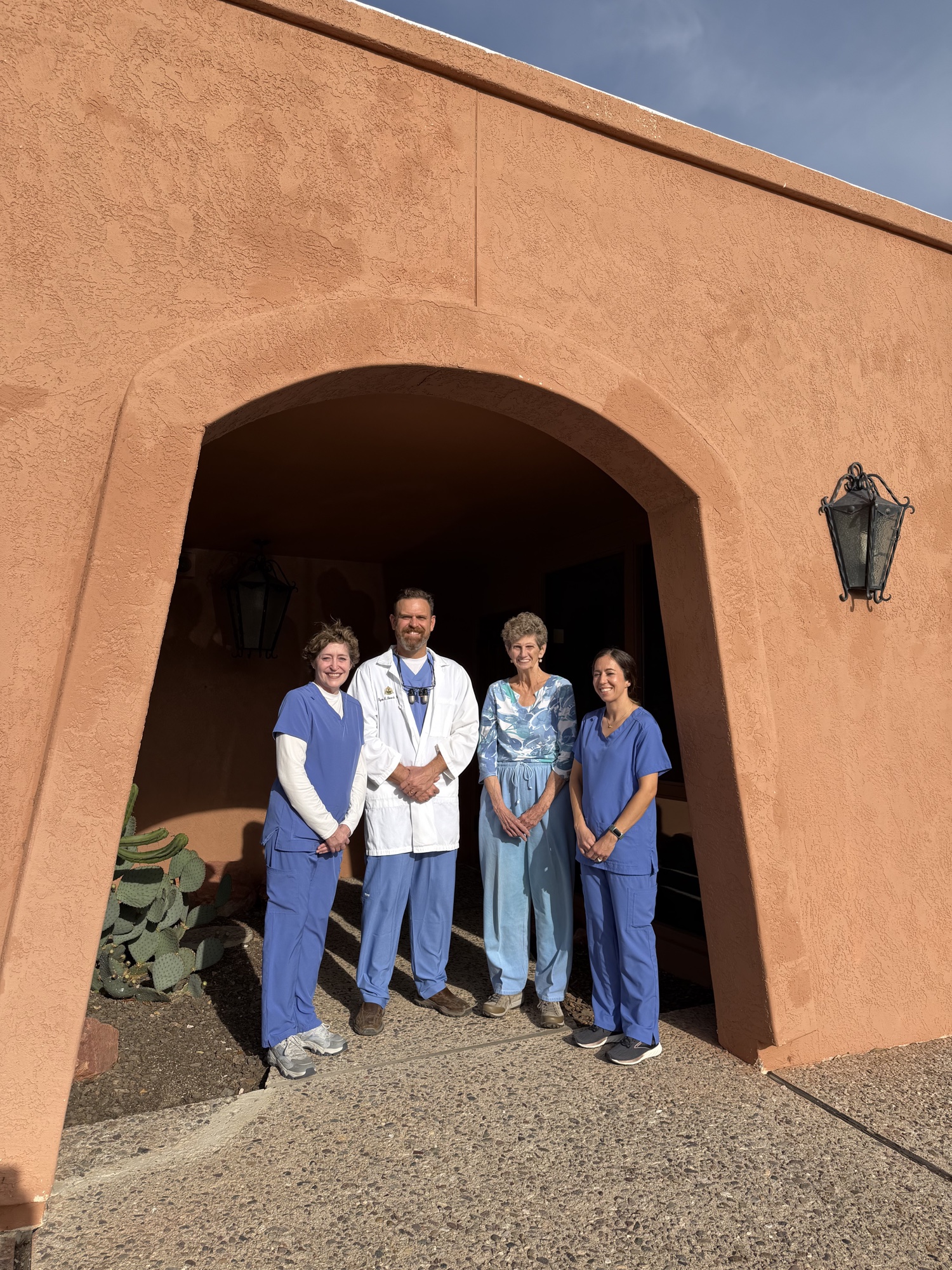 Dr. Ryan Noseck and the dental team outside the Tucson office